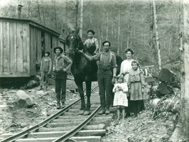 Young_family_in_lumber_camp_medium